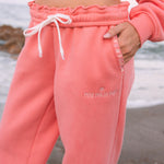 matching coral pink set, with pink palm puff pattern border