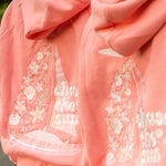 matching coral pink set, with pink palm puff pattern border