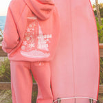 matching coral pink set, with pink palm puff pattern border