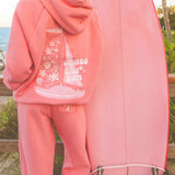 matching coral pink set, with pink palm puff pattern border