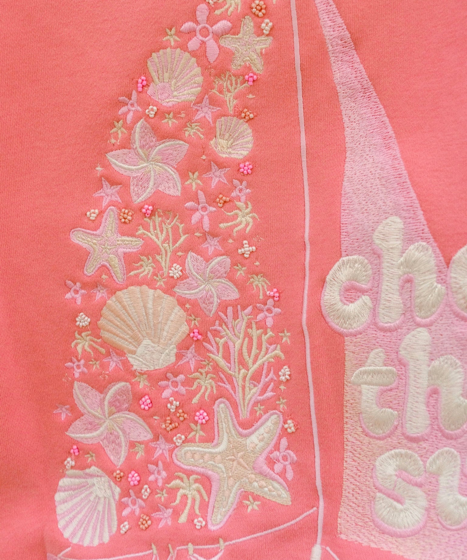 matching coral pink set, with pink palm puff pattern border