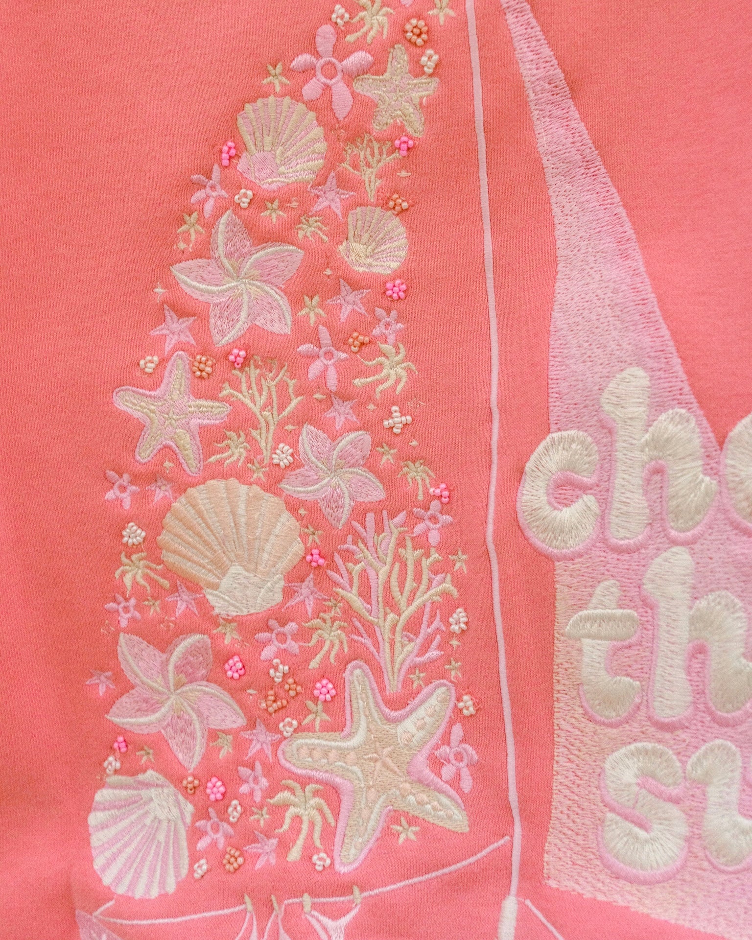 matching coral pink set, with pink palm puff pattern border