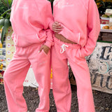 matching coral pink set, with pink palm puff pattern border