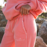matching coral pink set, with pink palm puff pattern border