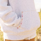 "Chase the Sun" Relaxed Hoodie, relaxed fit with an adjustable drawstring hood and pocket, in Heather Cloud - coastal preppy aesthetic beach style by Pink Palm Puff