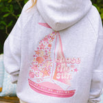 "Chase the Sun" Relaxed Hoodie, relaxed fit with an adjustable drawstring hood and pocket, in Heather Cloud - coastal preppy aesthetic beach style by Pink Palm Puff