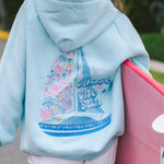 "Chase the Sun" Relaxed Hoodie, relaxed fit with an adjustable drawstring hood and pocket, in Sky Blue - coastal preppy aesthetic beach style by Pink Palm Puff