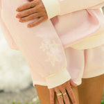 "Daydream" Classic Crew, ribbed crew neckline and relaxed fit, in Angel Pink - coastal preppy aesthetic beach style by Pink Palm Puff
