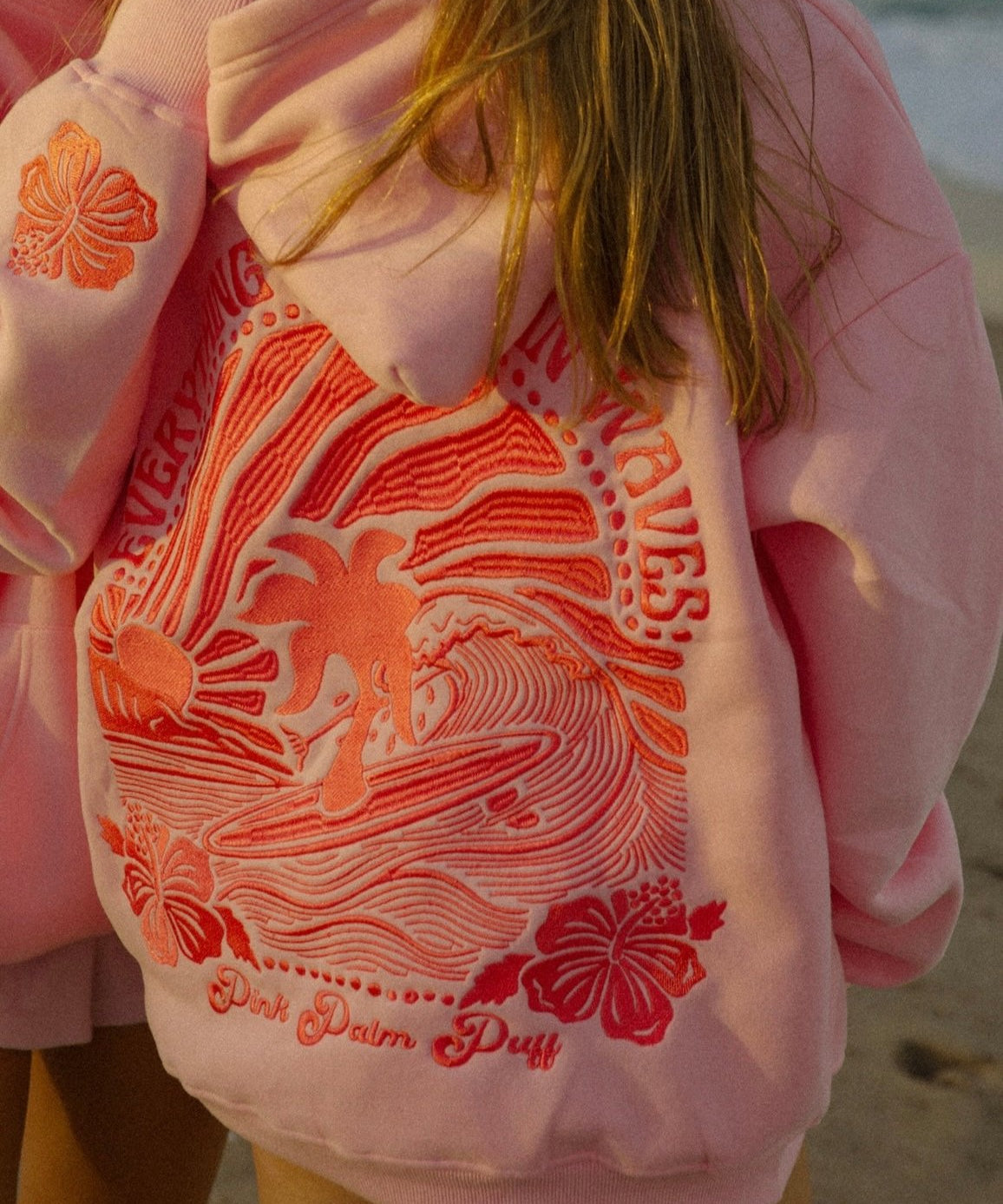 "Everything Comes in Waves" Hoodie in Pink by Pink Palm Puff