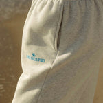 Puff Sweatpants, relaxed fit with an elastic waistband and side pockets, in Heather White - coastal preppy aesthetic beach style by Pink Palm Puff