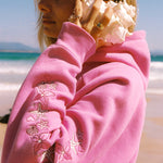 "Under the Sea" Relaxed Hoodie, relaxed fit with an adjustable drawstring hood and pocket, in Seashell Pink - coastal preppy aesthetic beach style by Pink Palm Puff